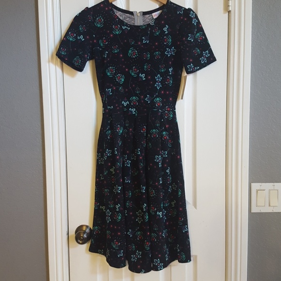 LuLaRoe Dresses & Skirts - Lularoe Amelia Size XS flowers Black background